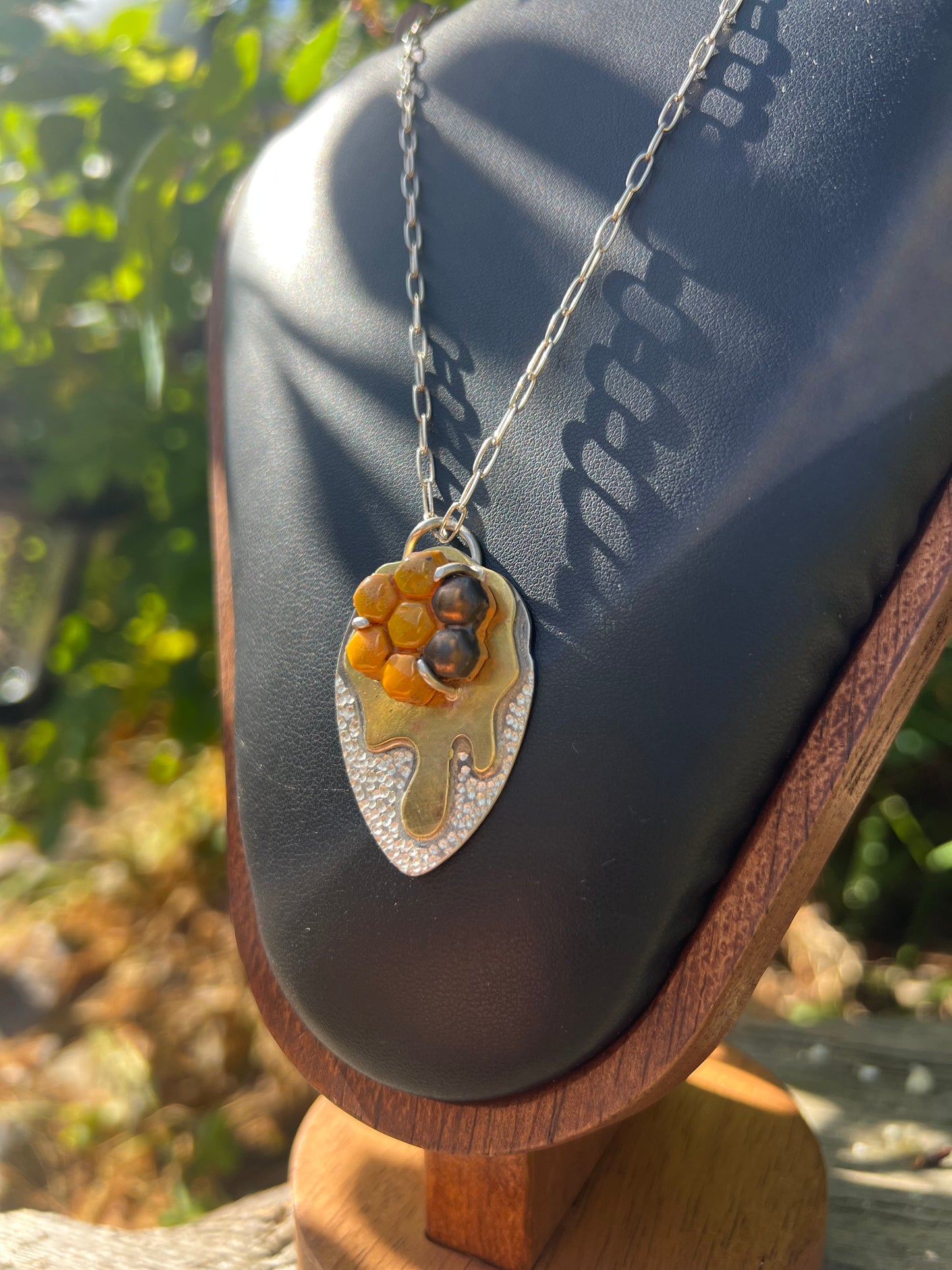 Honey comb, shield pendant necklace.