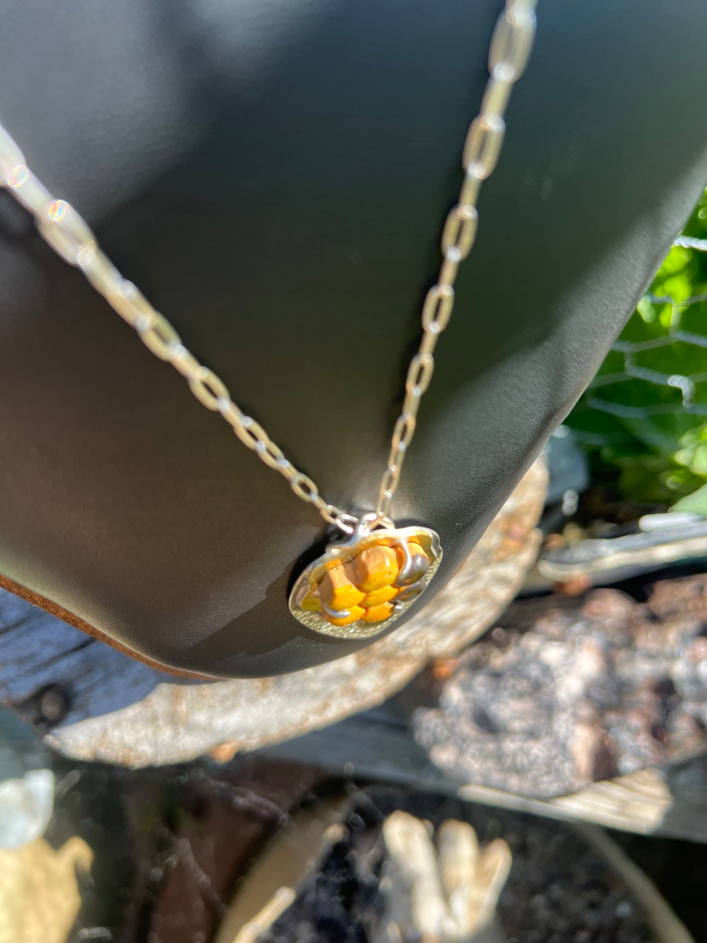 Honey comb, shield pendant necklace.