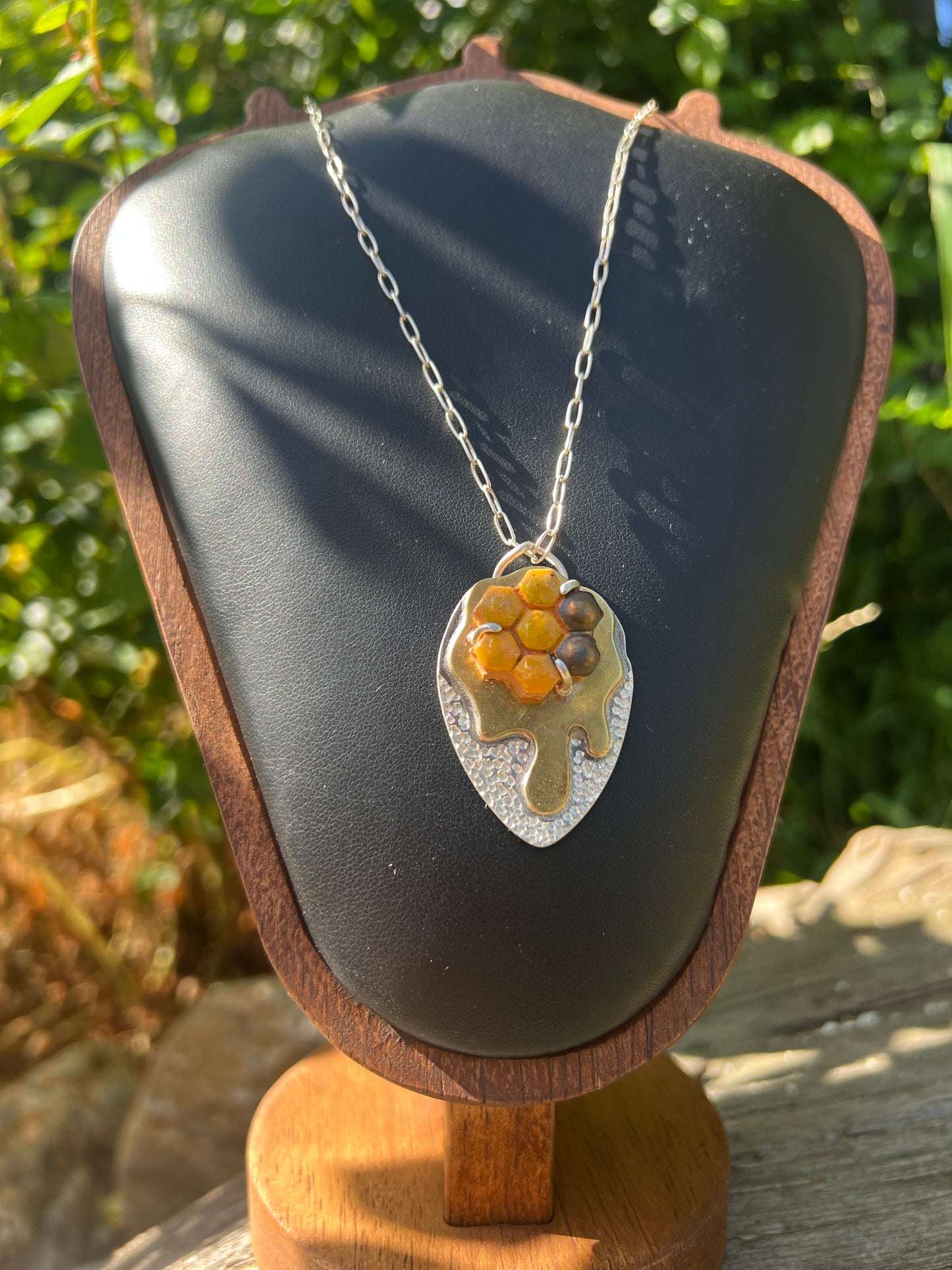Honey comb, shield pendant necklace.