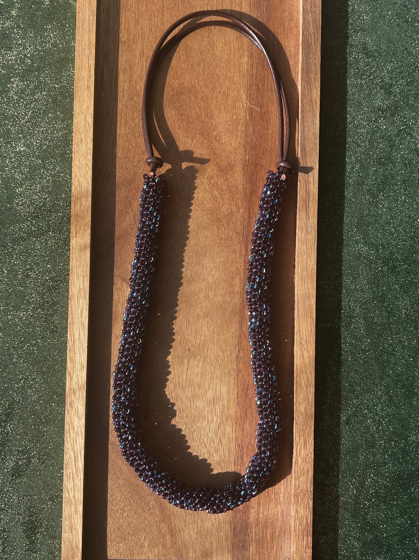 Hand beaded, minimalist, adventure ready necklace.